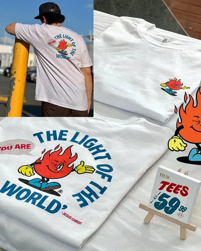 Promotional photo of a shirt with the text Light of the world