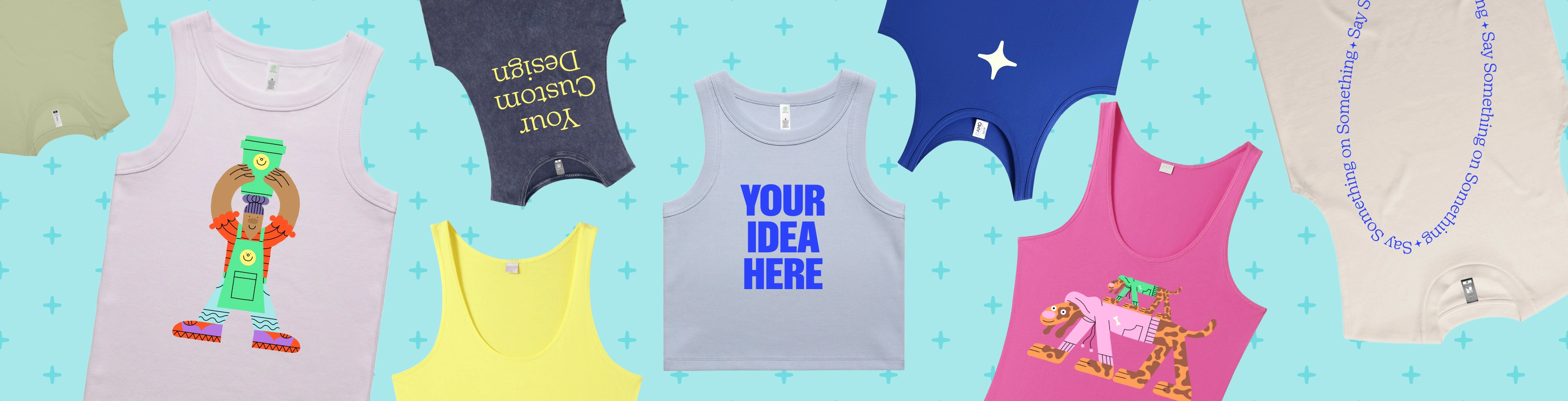 Image with custom printed tank tops that have the text "design your own" printed on them
