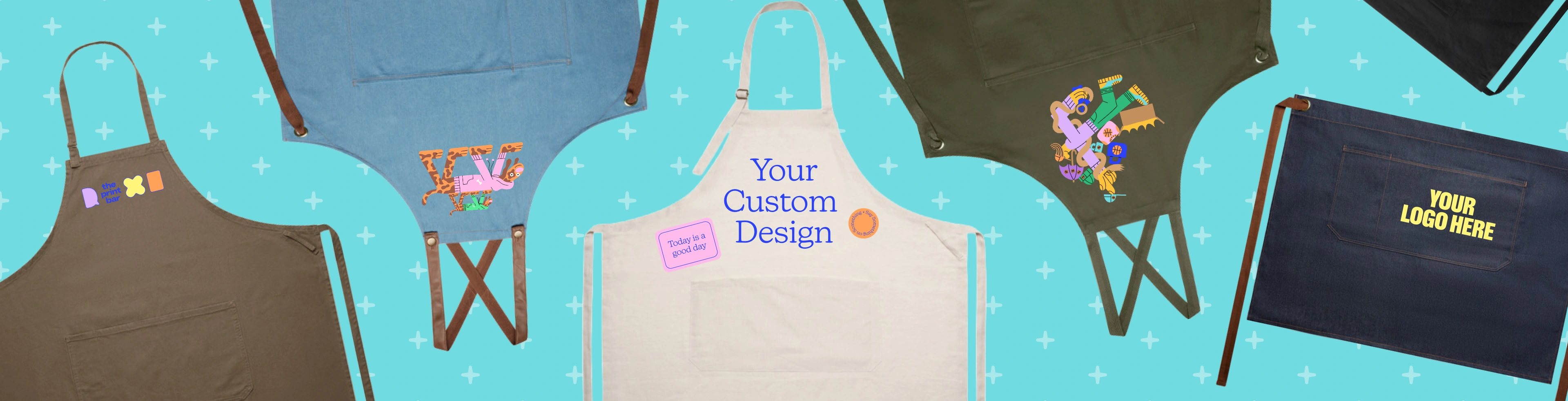 Image with custom embroidered workwear that have the text "design your own" printed on them