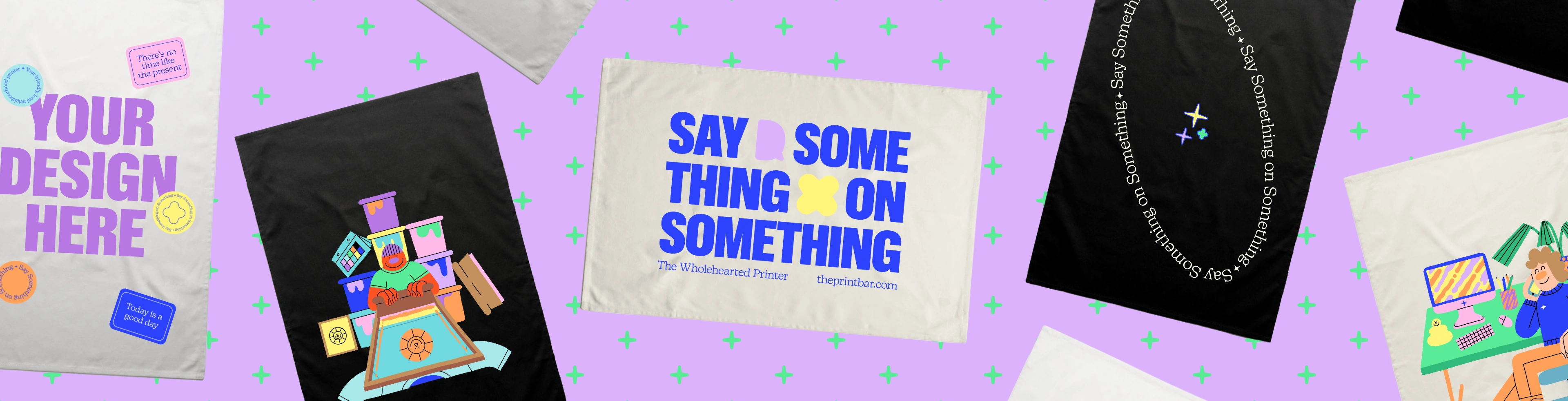 Image with custom printed tea towels that have the text "design your own" printed on them