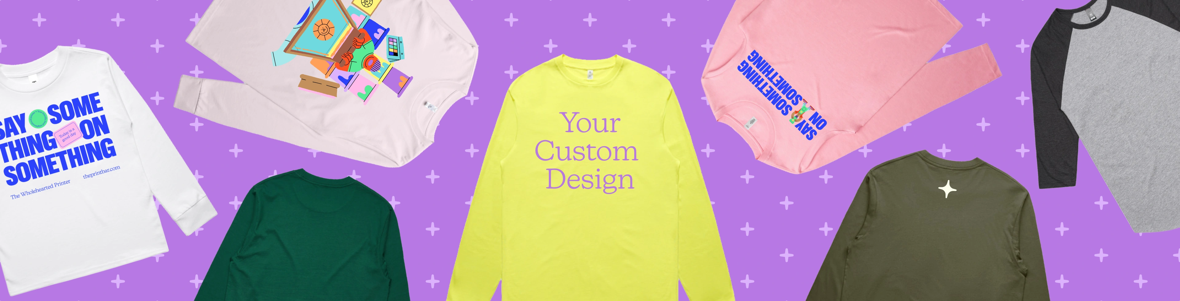 Image with custom printed long sleeve tees that have the text "design your own" printed on them