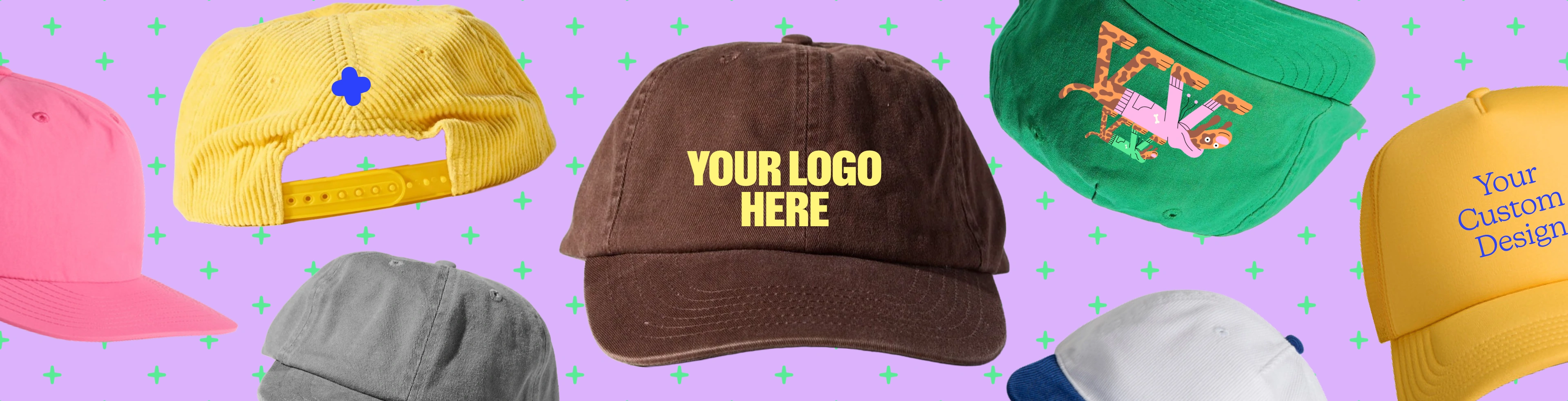 Image with custom hats and embroidered caps that have the text "design your own" printed on them