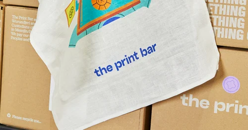 Tea towel with The Print Bar written on it